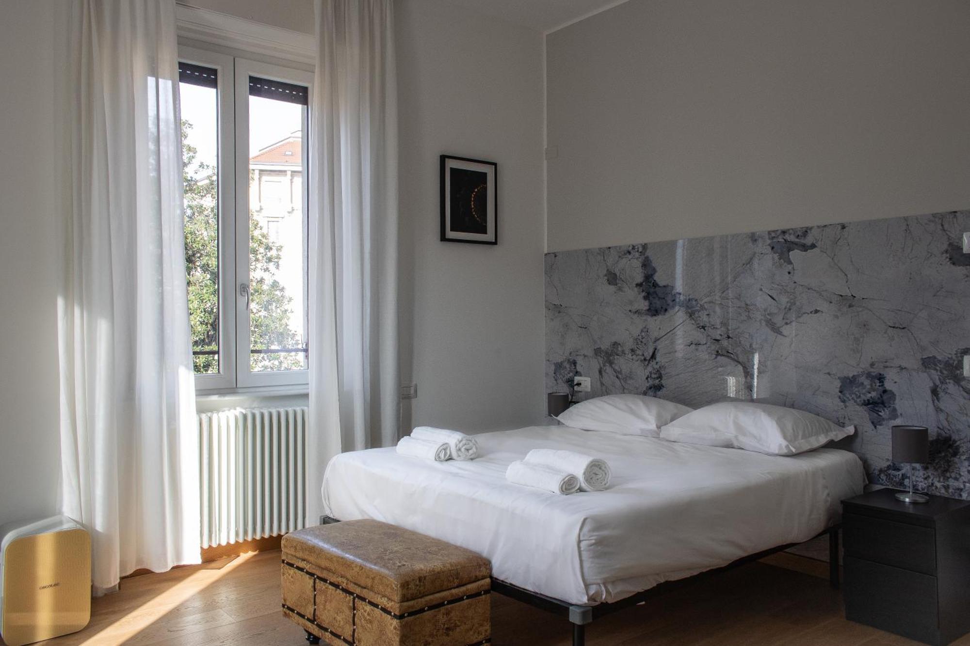 Rrrapido Holy Suites And Rooms - Via Sardegna ميلان المظهر الخارجي الصورة