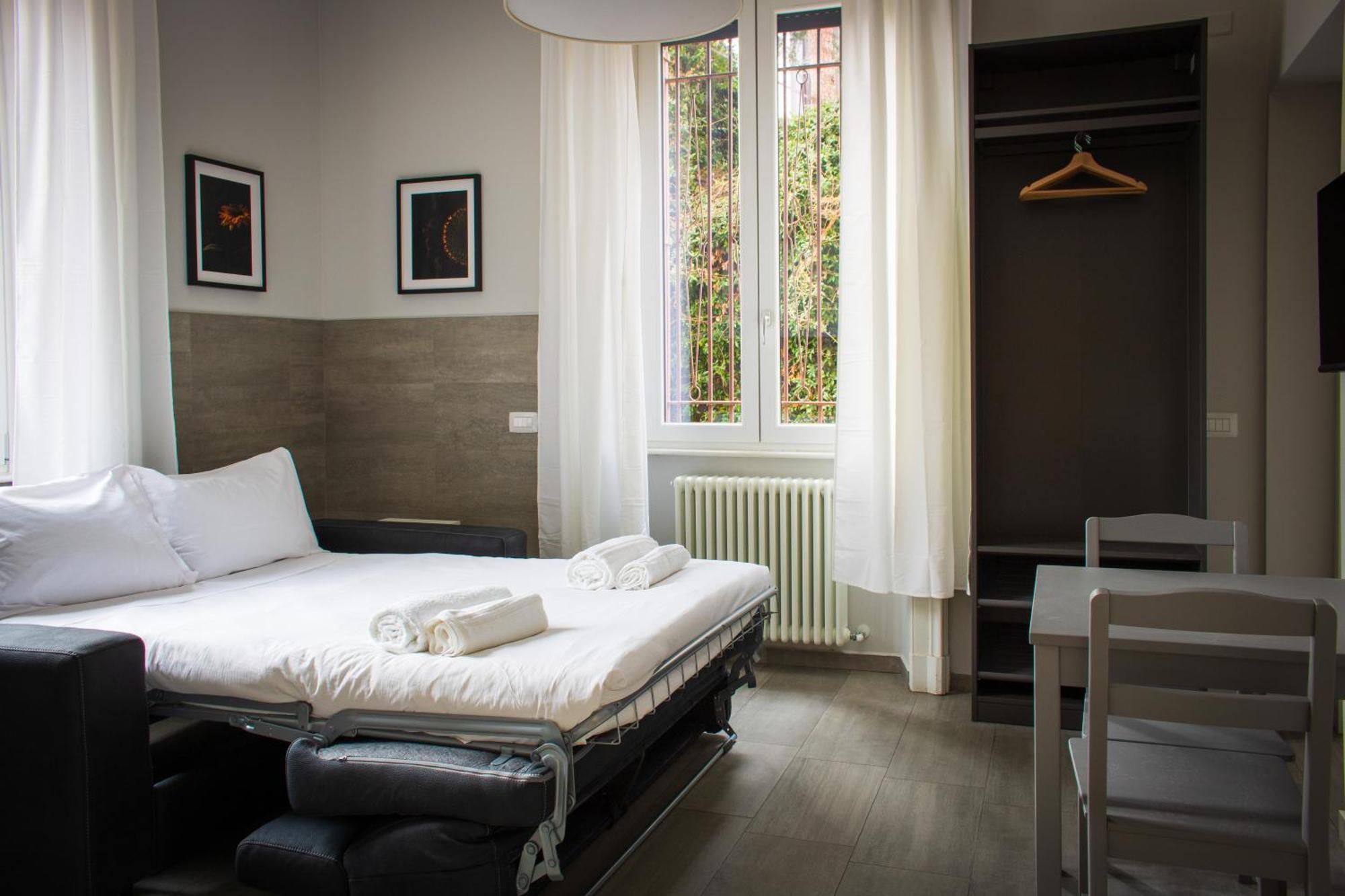 Rrrapido Holy Suites And Rooms - Via Sardegna ميلان المظهر الخارجي الصورة